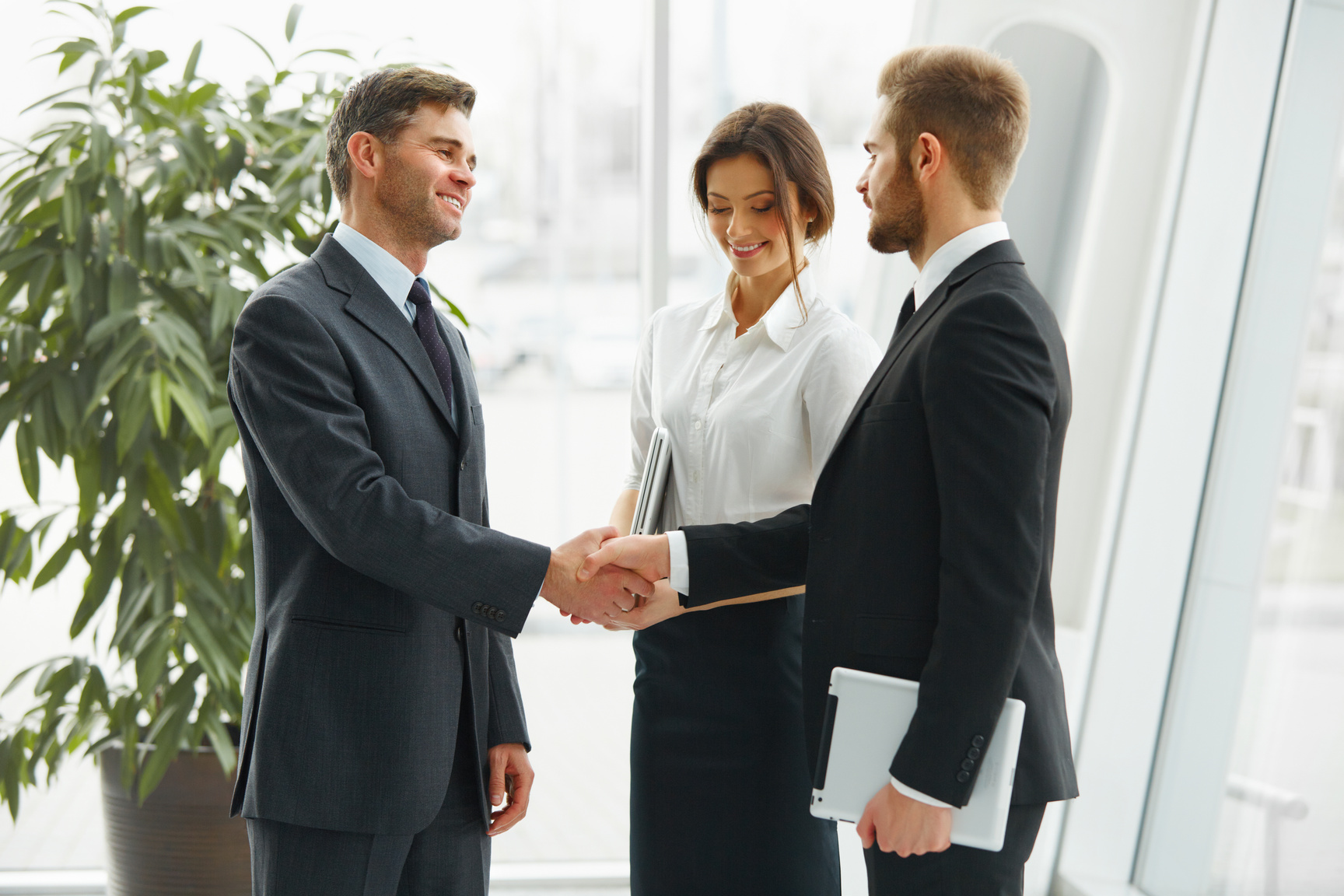 Businessman shaking hands. People shake hands communicating